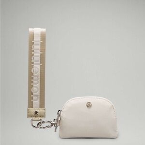 Lululemon | Dual Pouch Wristlet Wordmark | O/S | Raw Linen / White Opal | EUC